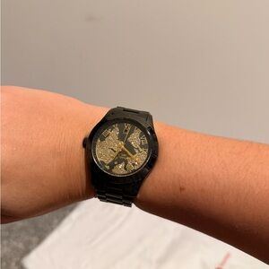 Michael Kors Elegant golden globe watch